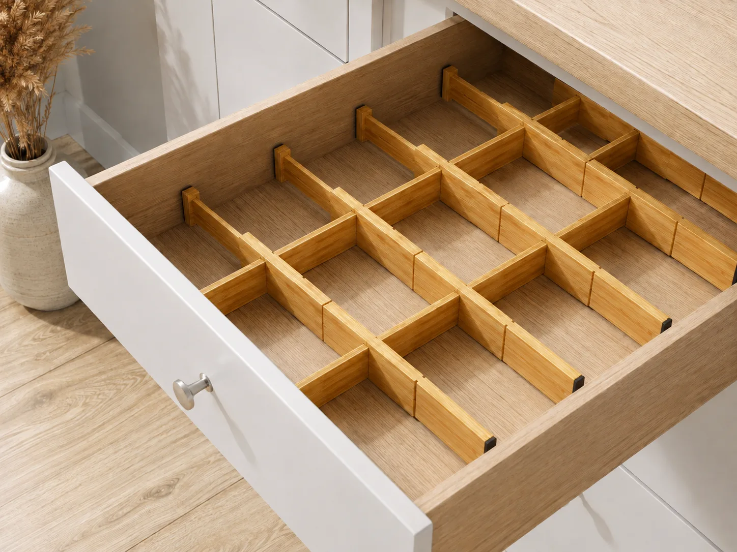 Three-quarter view of bamboo dividers installed in a drawer